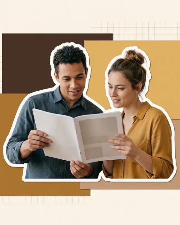 Two colleagues checking a finished document translation together